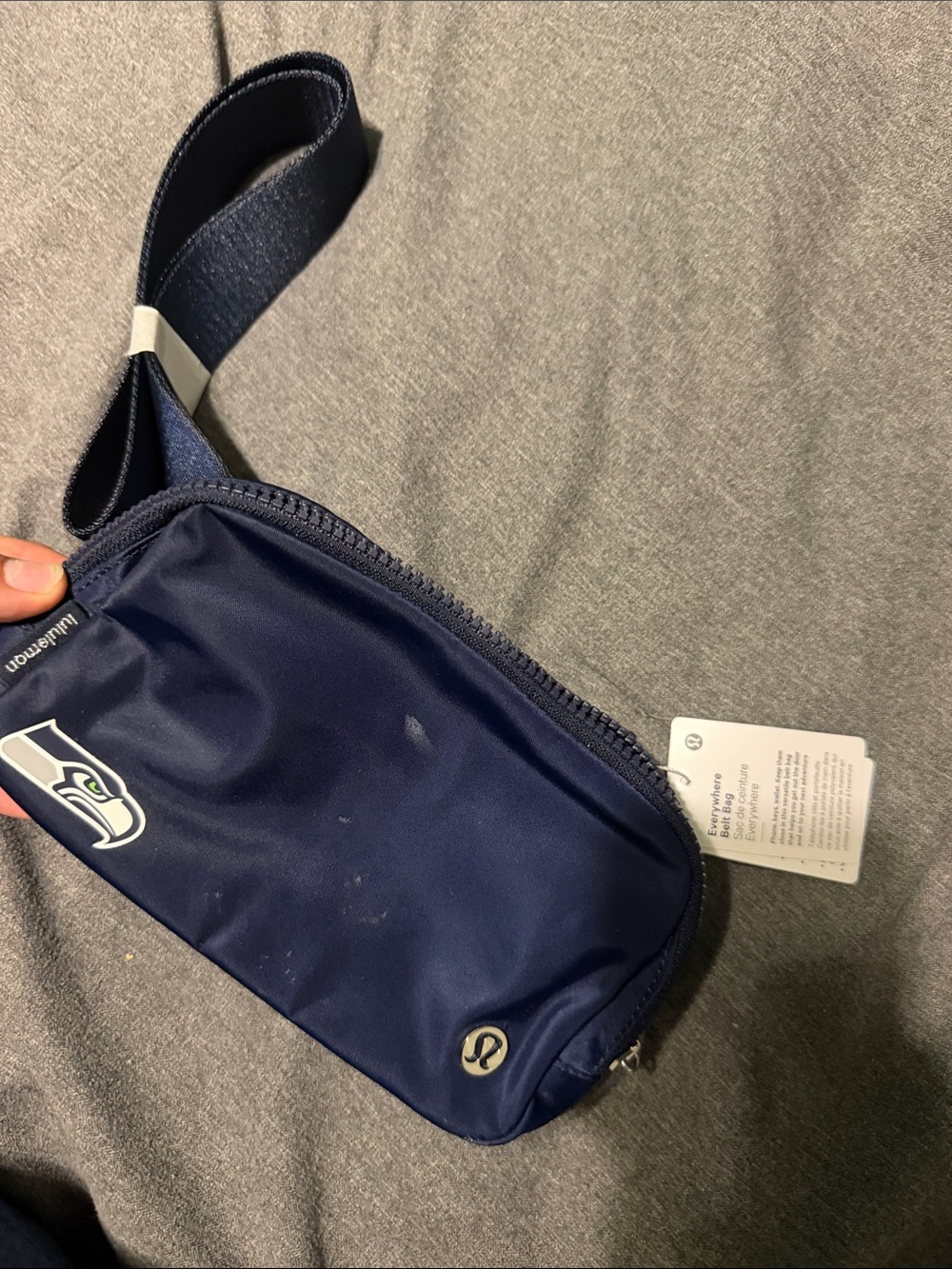 lululemon athletica navy blue sling belt bag with Seattle Seahawks patch